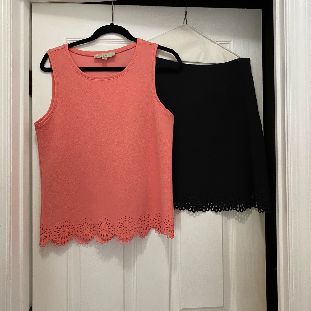 Black skirt, matching coral top